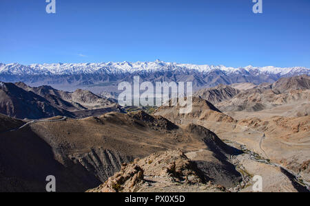 The Stok Range, with Stok Kangri (6123m) and Leh city, seen from the Khardung La Pass, Ladakh, India Stock Photo