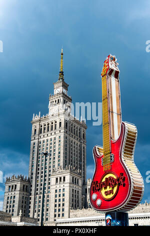 Citiscape with symbol of Hard Rock Cafe and Palace of Culture and Science in the background Stock Photo