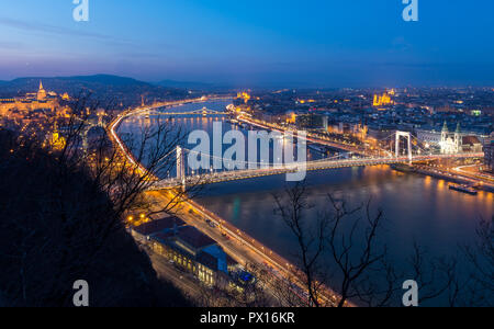 Blue hour view over Danube River with Margaret Bridge and Chain Bridge in Budapest, Hungary. Stock Photo