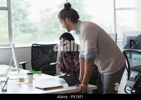 Businessmen working together in the office Stock Photo