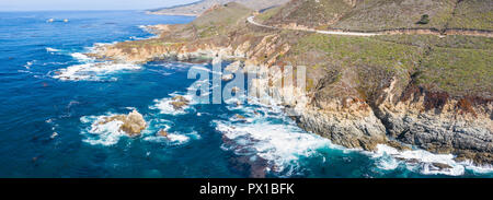 The cold, nutrient-rich waters of the Pacific Ocean swirl against the rocky and scenic coastline of Northern California not far from Monterey. Stock Photo