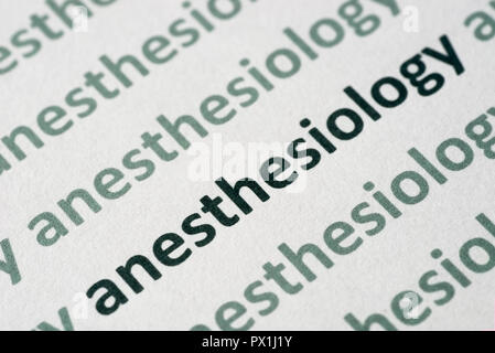 word anesthesiology printed on whte paper macro Stock Photo