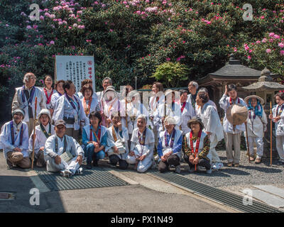A group of bus pilgrims, Yokomineji temple 60, Shikoku 88 temple  pilgrimage, Ehime, Japan Stock Photo