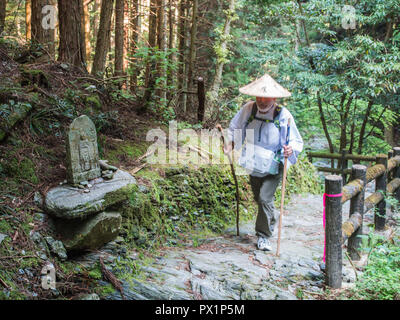 Henro pilgrim walking,  henro korogashi forest trail,  to Yokomineji temple 60, Shikoku 88 temple  pilgrimage, Ehime, Japan Stock Photo
