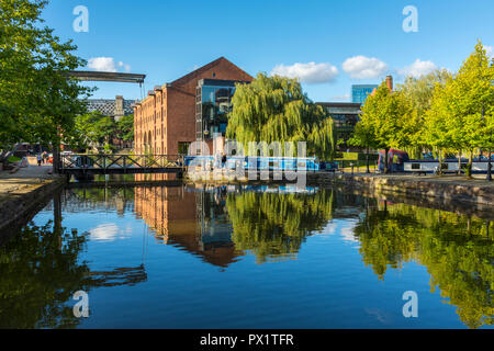 The Merchants' Warehouse from the Middle Warehouse basin, Castlefield, Manchester, England, UK Stock Photo