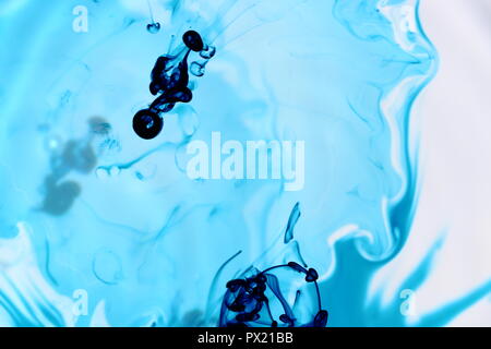 Naturally Flowing Blue Food Dye in Water Stock Photo