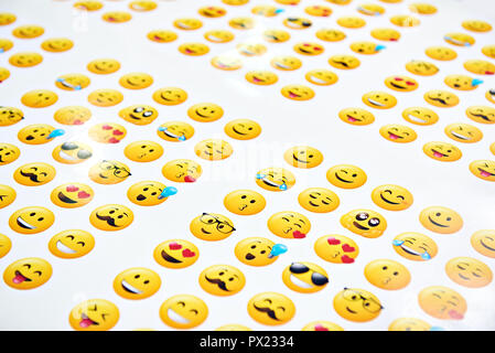 Funny yellow smileys on a white background Stock Photo