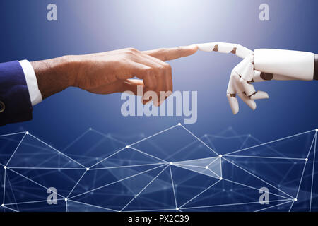 Businessman Touching Robot Finger On Futuristic Background Stock Photo