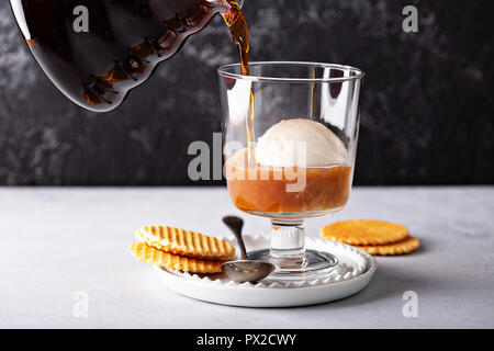 Coffee with vanilla ice cream, affogato in a dessert glass Stock Photo