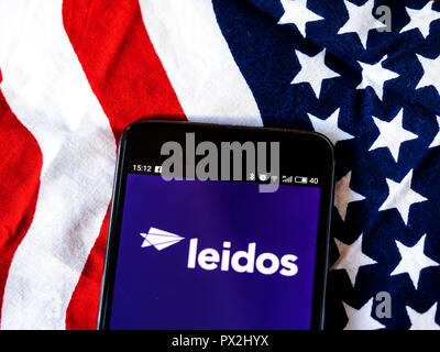 Leidos Scientific research company logo seen displayed on smart phone. Leidos, formerly known as Science Applications International Corporation, is an American defense, aviation, information technology, and biomedical research company,  that provides scientific, engineering, systems integration, and technical services. Stock Photo