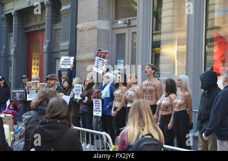 Manhattan United States. 18th Oct 2018. Today animal rights protesters showed up outside the new Canada Goose store in Soho New York City. As temperatures drop and New Yorkers start shopping for winte...