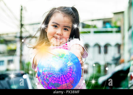 Education is important in laying the foundations of life, school children happily go to school, strive to learn new things,Earth, Sun halo many of the Stock Photo