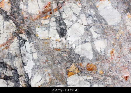 Ideal marble texture in light gray and orange colours. Stock Photo