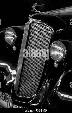 Moscow, Russia August 29, 2018. Museum of Moscow Transport. Headlights and a radiator of a vintage black car. Stock Photo