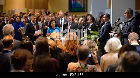 Czech Prime Minister Andrej Babis, right, Czech EU Commissioner Vera Jourova, in blue, Slovakian PM Peter Pellegrini, left, and EC Vice President Maros Sefcovic, second from left, pose in the Berlaymont, the EU Commission headquarters, at the ceremonial opening of the multimedia exhibition The Czech and Slovak Century, which the two countries' PMs Andrej Babis and Peter Pellegrini opened in the EC seat today, on Thursday, October 18, 2018, shows the history, personalities and achievements of Czechoslovakia on its upcoming 100th birth anniversary. 'This is as if a couple that had divorced were Stock Photo