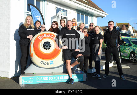 Brighton UK 19th October 2018 - Norman Cook aka Fatboy Slim is changing his name to Fatboy Slow as he sets off on a 26 mile walk to visit all the giant snail sculptures around Brighton and Hove in one day helping to raise money for the Martlets Hospice . There are over 50 snail sculptures to visit covering a distance of 26 miles on the Snailspace Art Trail's fundraising #BeMoreSnail day Credit: Simon Dack/Alamy Live News Stock Photo