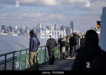 Seattle, Washington, USA. 6th Oct, 2018. Ferry passengers view the Seattle skyline during a ferry passage in downtown Seattle, Washington, on October 6, 2018. (Credit Image: © Alex EdelmanZUMA Wire) Stock Photo