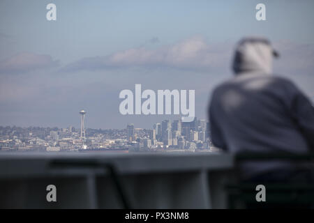 Seattle, Washington, USA. 6th Oct, 2018. Ferry passengers view the Seattle skyline during a ferry passage in downtown Seattle, Washington, on October 6, 2018. (Credit Image: © Alex EdelmanZUMA Wire) Stock Photo
