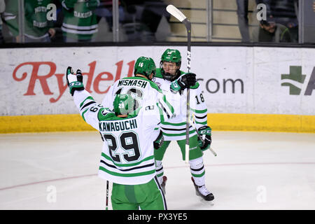 October 19, 2018 North Dakota Fighting Hawks forward Collin Adams (18) celebrates with teammates after scoring a goal in the first period of an NCAA men's college hockey game between the Minnesota State Mavericks and the University of North Dakota Fighting Hawks at Ralph Engelstad Arena in Grand Forks, ND Mankato won 7-4. Photo by Russell Hons/CSM Stock Photo