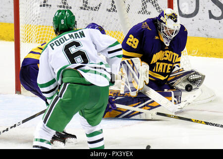 October 19, 2018 North Dakota Fighting Hawks defenseman Colton Poolman (6) shoots the puck against Minnesota State Mavericks goaltender Dryden McKay (29) during a NCAA men's college hockey game between the Minnesota State Mavericks and the University of North Dakota Fighting Hawks at Ralph Engelstad Arena in Grand Forks, ND Mankato won 7-4. Photo by Russell Hons/CSM Stock Photo