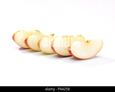 five pieces of sliced apple on a white background Stock Photo