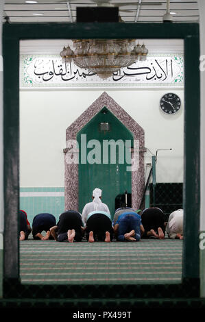 The green Mosque or the Masjid Jamae one of the earliest mosques in Singapore located in  Chinatown. Muslims praying. Salat. Singapore. Stock Photo