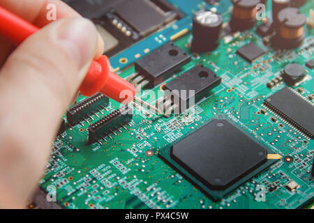 Printed Circuit Board with many electrical components. Stock Photo