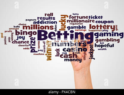 Betting word cloud and hand with marker concept on white background. Stock Photo