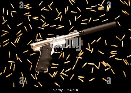 Pistol with silencer and live ammunition Stock Photo