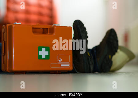 First aid after an accident at work Stock Photo
