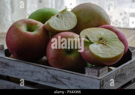 Delicious fresh red apples  İn the wooden box. Stock Photo