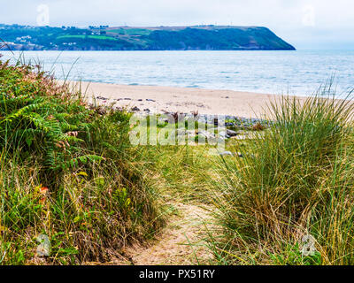 Traeth beach near Penbryn on the Welsh coast in Ceredigion, looking towards Aberporth. Stock Photo