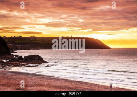 Sunset over the beach at Tresaith in Ceredigion, Wales. Stock Photo