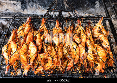 BBQ SeaFood: Grilled king size prawns on fire Stock Photo