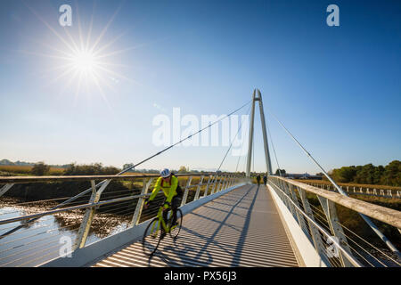 A cyclist and pedestrians on Diglis Bridge over the River Severn at Worcester, Worcestershire, England Stock Photo