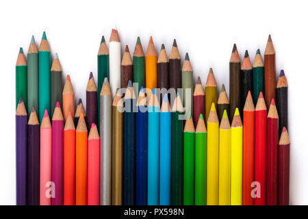 Close up of two rows of color pencils isolated on white background. Stock Photo