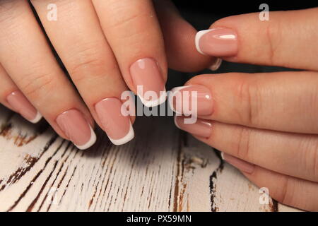 Perfect manicure and natural nails. Attractive modern nail art Stock Photo  - Alamy