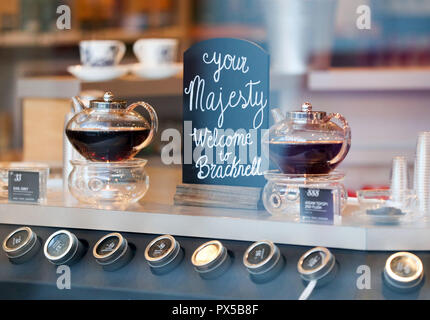 A sign welcoming Queen Elizabeth II is seen in the Whittard Tea shop in the Lexicon shopping centre in Bracknell. Stock Photo