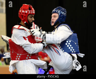 Great Britain's Bradly Sinden (right) during his first round win against Canada's Siddhartha King Bhat, during day one of the WTF World Taekwondo Grand Prix 2018 at the Regional Arena, Manchester.