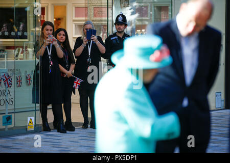 Staff photograph Queen Elizabeth II during a visit to the Lexicon shopping centre in Bracknell. Stock Photo
