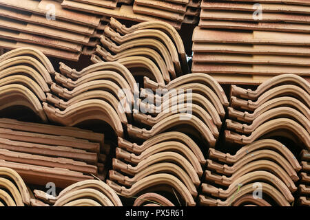 Ceramic tiles stacked and ready to be used on construction site Stock Photo
