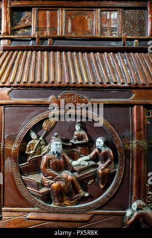 Museum of Traditional Vietnamese Medicine.  Wood carved relief of traditional medicine.  The traditional drug town. Ho Chi Minh City. Vietnam. Stock Photo
