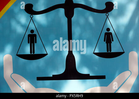 Male and female figures on scale. Gender equality.  Vung Tau. Vietnam. Stock Photo