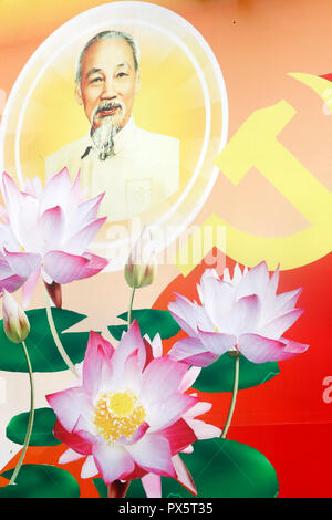 Communist government propaganda poster in the street. Cai Be. Vietnam. Stock Photo