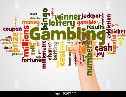 Gambling word cloud and hand with marker concept on white background. Stock Photo