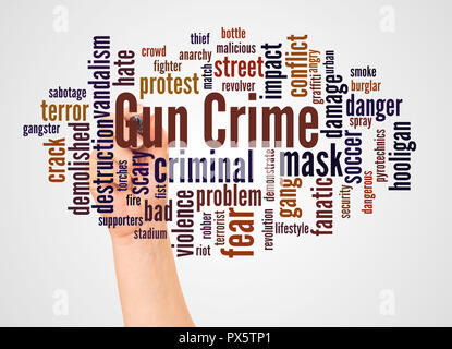 Gun Crime word cloud and hand with marker concept on white background. Stock Photo