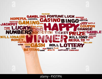 Happy Winner word cloud and hand with marker concept on white background. Stock Photo