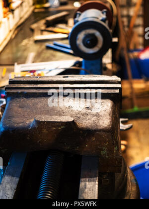 metalworking vise close up on the table in the home workshop Stock Photo