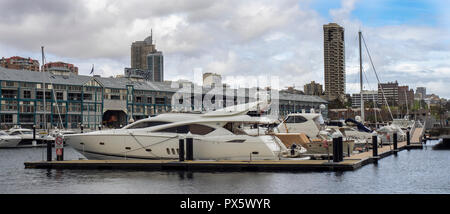 Finger Wharf redevelopment of wooden warehouses now Ovolo Hotel and residential apartments and marina Sydney NSW Australia. Stock Photo