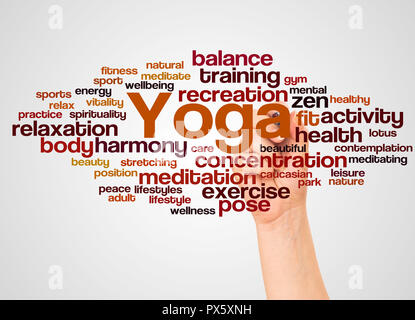 Yoga word cloud and hand with marker concept on gradient background. Stock Photo